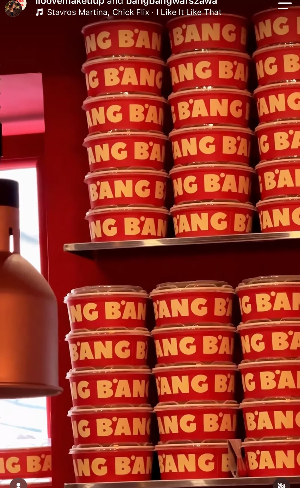 Stacks of red BANG BANG takeaway cups